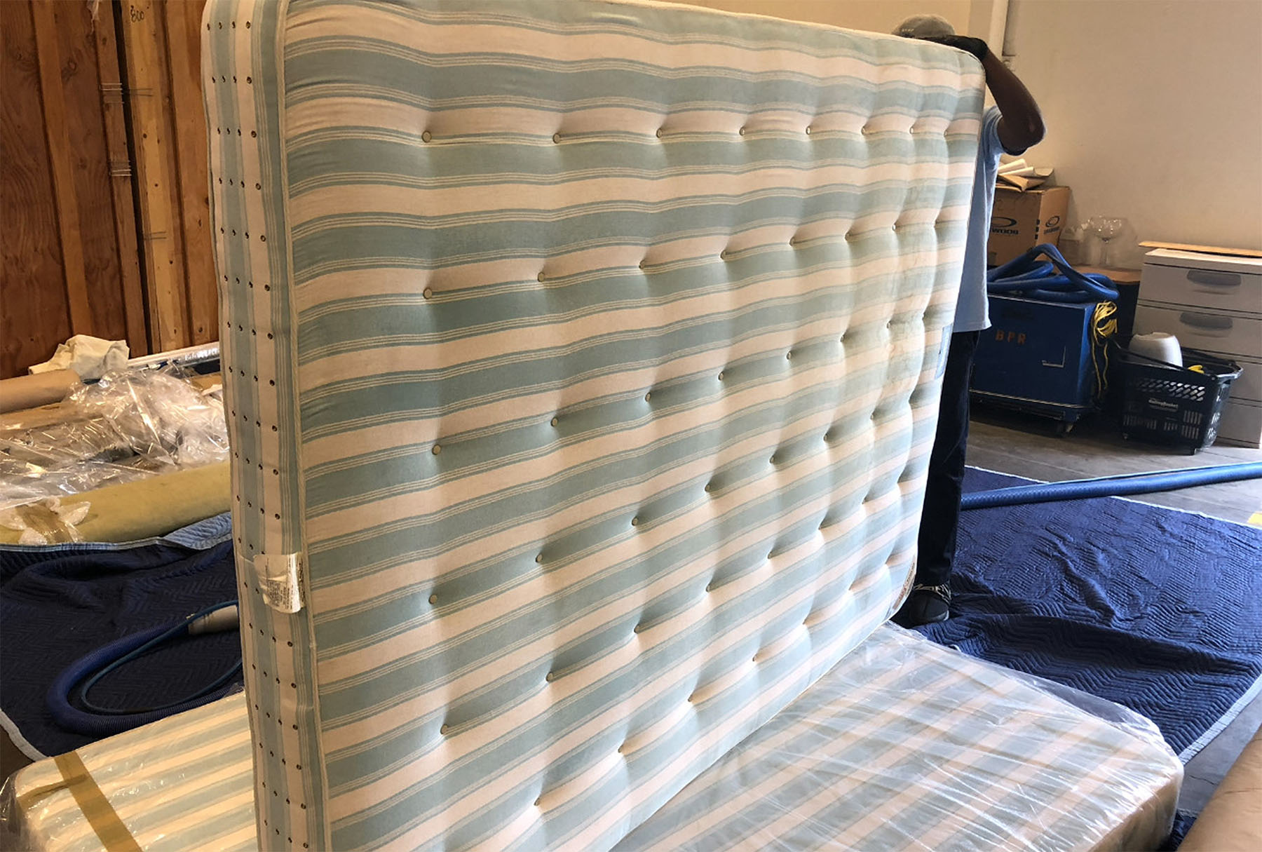 Freshly cleaned striped mattress with stains removed and fabric sanitized—after low-moisture, pet-safe mattress cleaning in Riverside County.